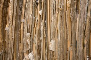 Detailed view of stacked recyclable cardboard showing texture and patterns.